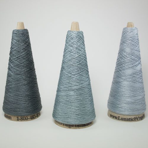 3 cones of Tubular Spectrum Yarn