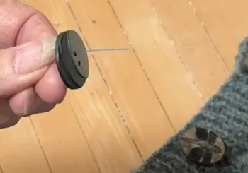 Floss Threader Up on Micheles Sweater